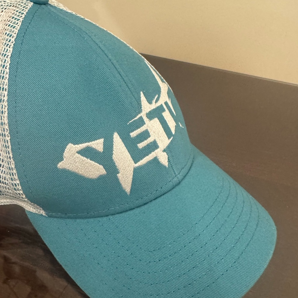 Yeti trucker hat. 
Men’s or women’s. Teal and White Logo Cap one size